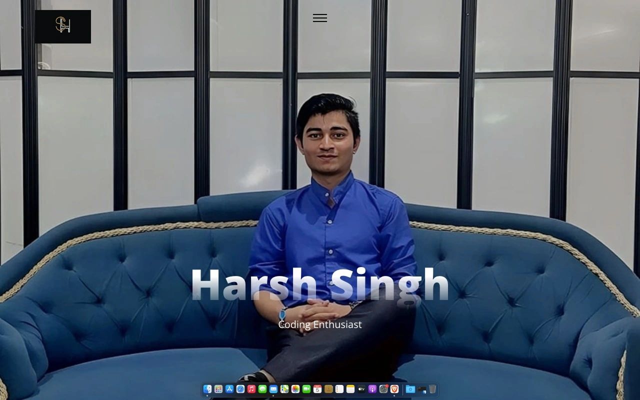 People at a concert facing the stage with various colours of paint powder in the air